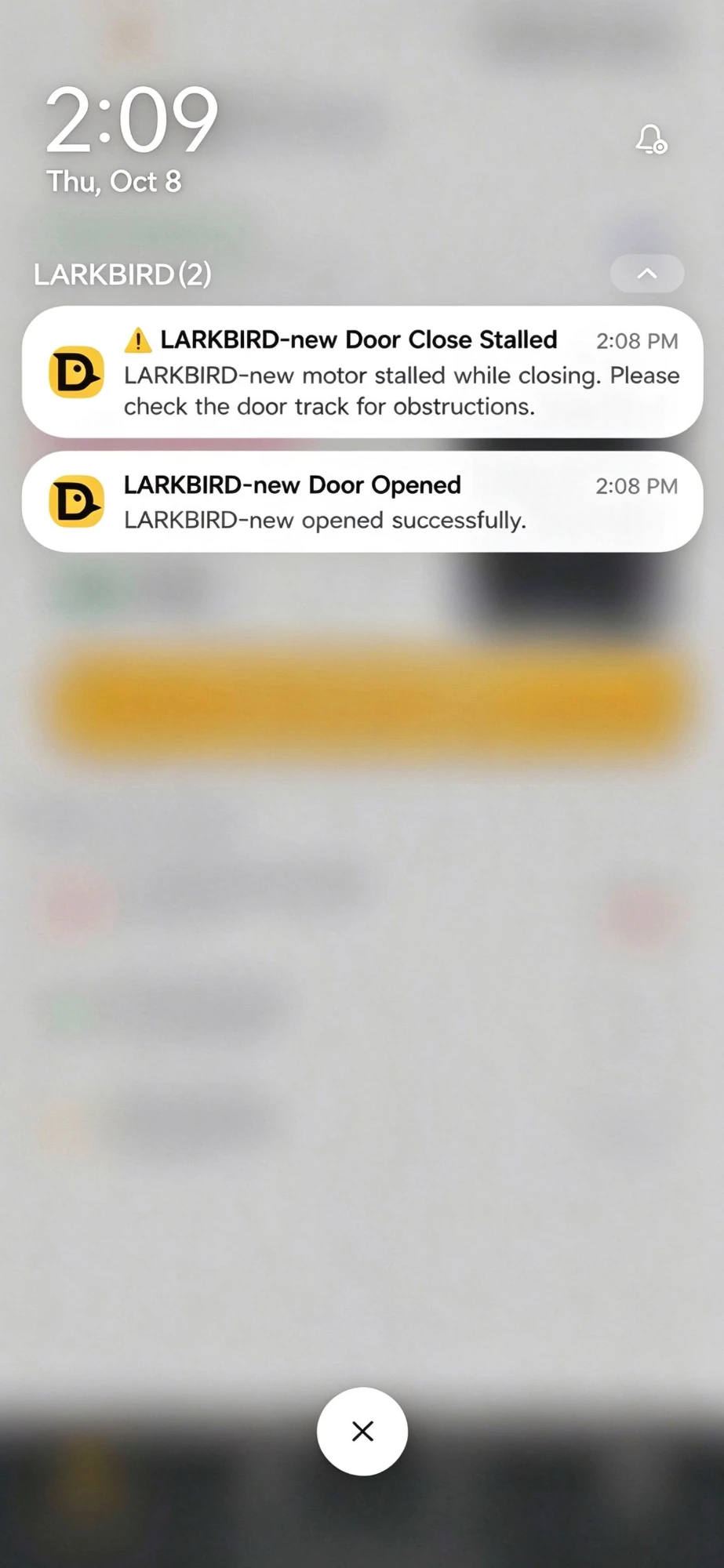Phone push notifications from the app: a warning that the door stalled while closing — check the track for obstructions — beside a confirmed Door Opened message.