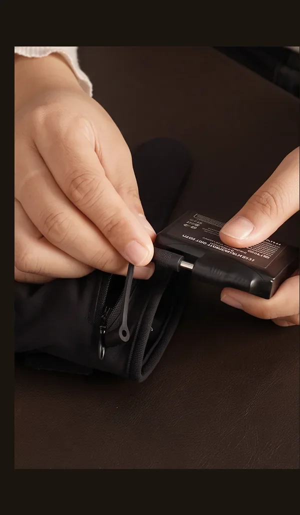 Step one: click the battery into the back of the glove